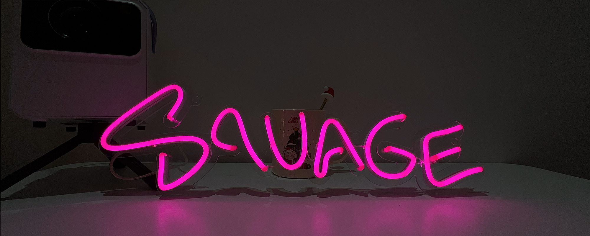 Lamomo Neon Hustle Sign At Night